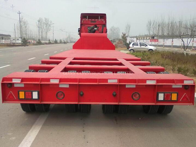 Mengangkut alat berat 150T 3 baris 6 gandar trailer lowbed